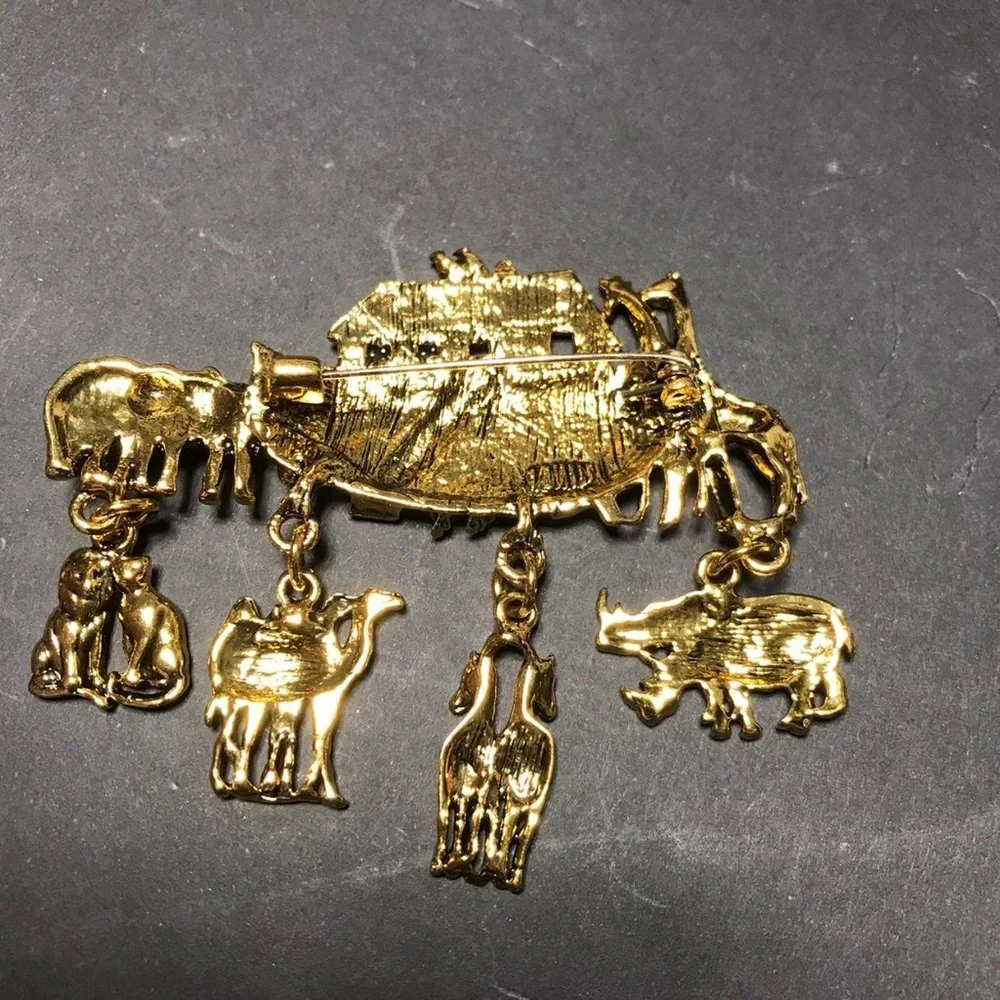 Gold tone Noahs ark brooch pin with animal dangle charms
